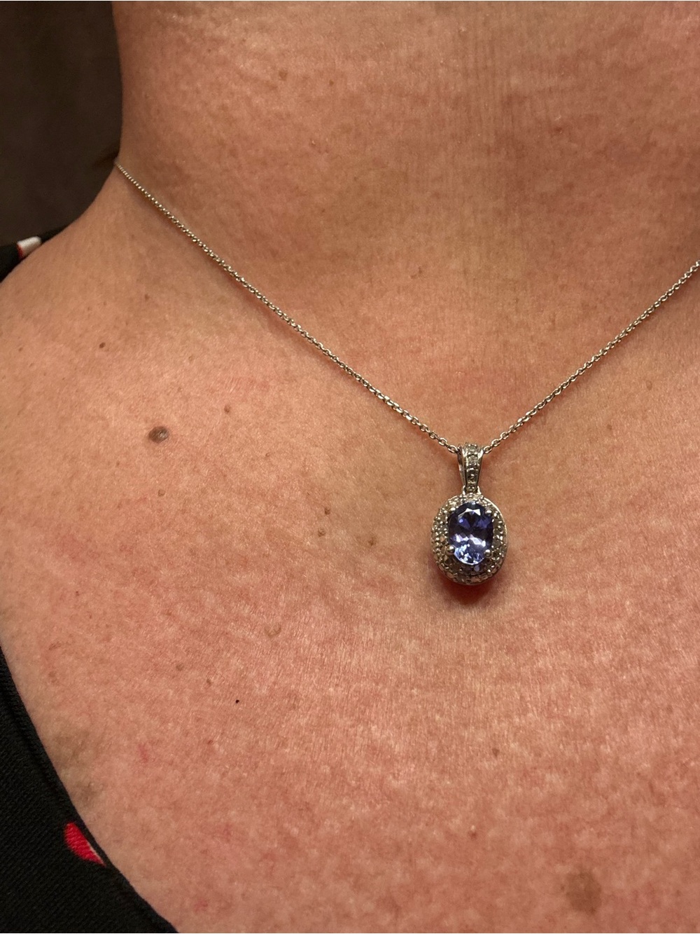 Sterling Silver Halo Pendant Necklace with  Tanzanite center stone and diamonds